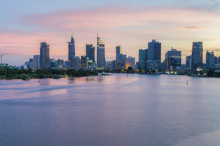 Ho Chi Minh City skyline across the Saigon River at dusk
